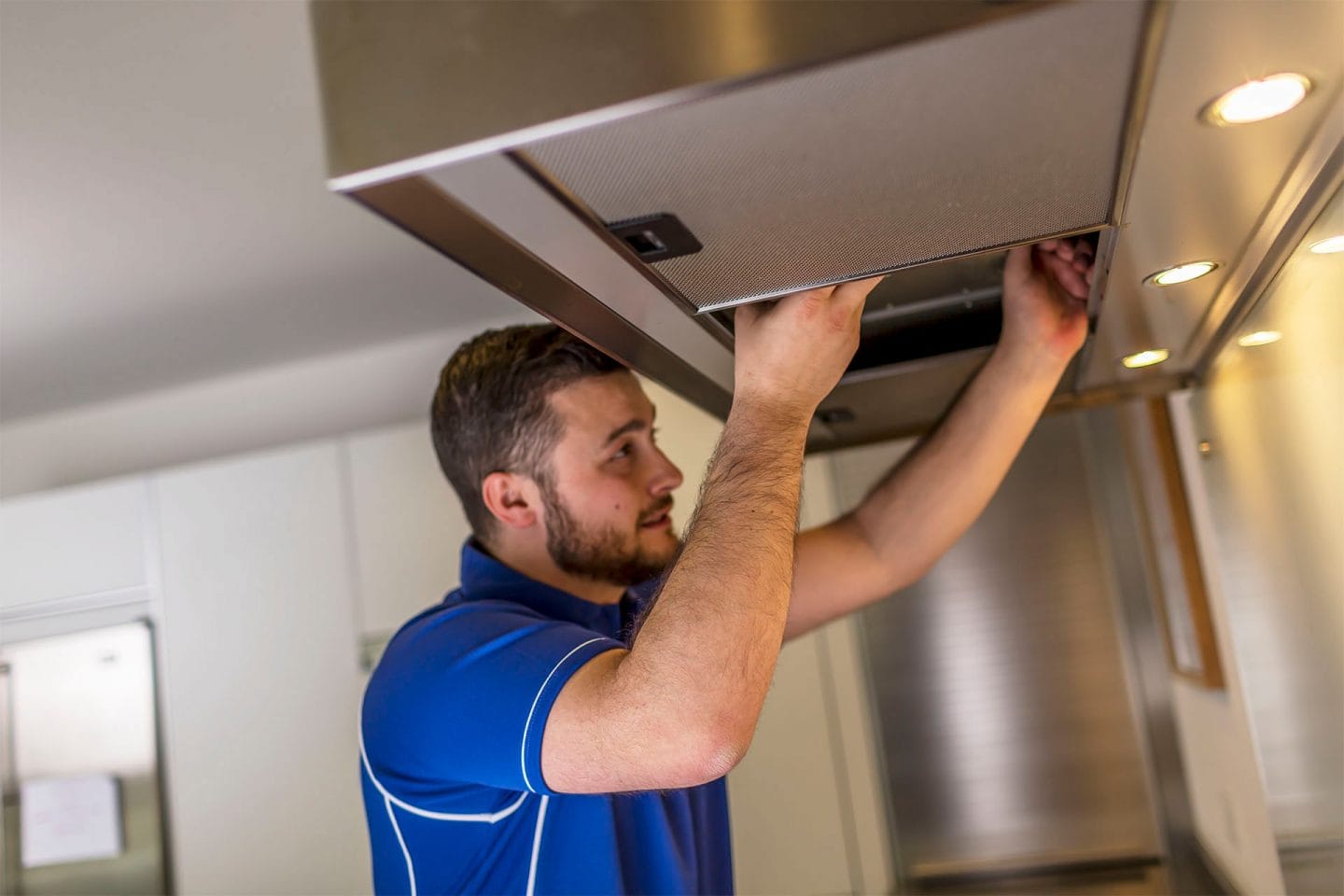 Kitchen hood installer fitting commercial canopy in Peterborough
